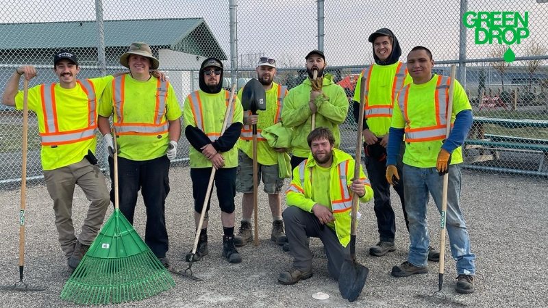 Green Drop employees after tree removal