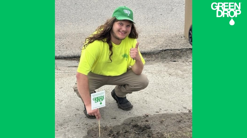 Green Drop employee thumbs up lawn autumn preparation