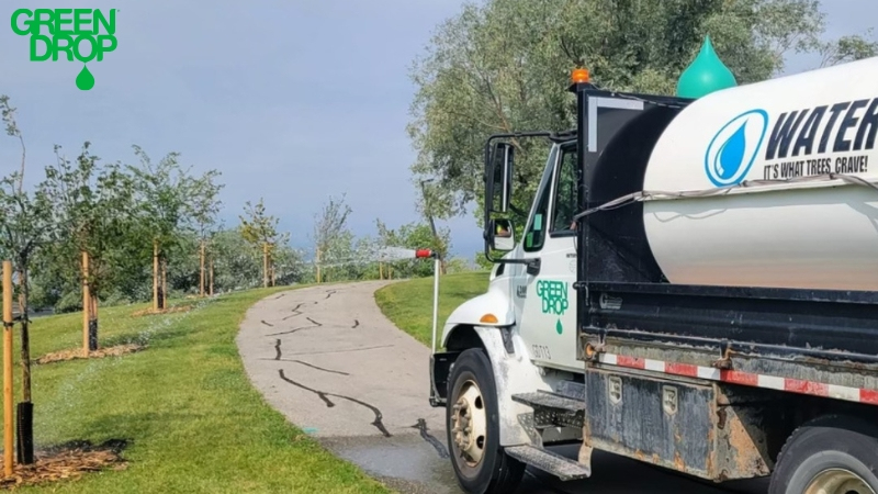 Green Drop truck in Alberta watering lawns during drought